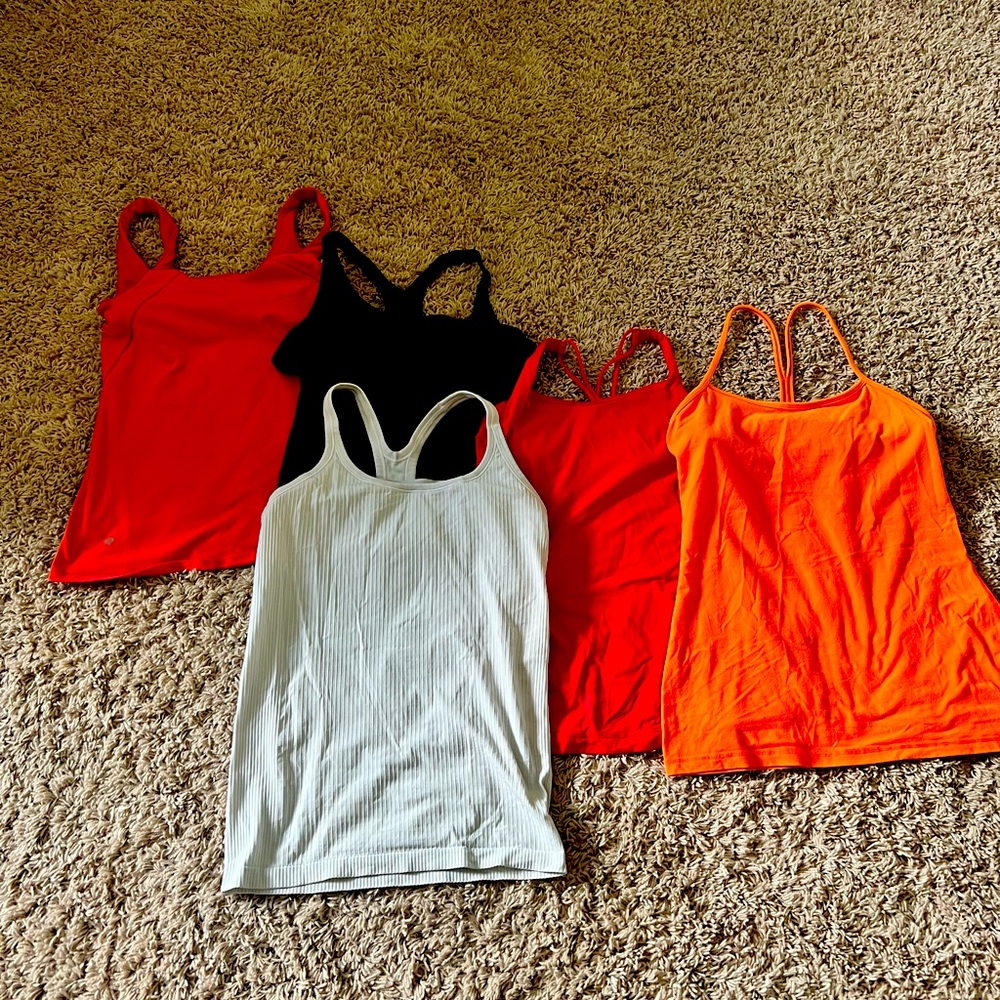 Lot of 5 Lululemon workout tops Size 8 in different styles: red, orange black